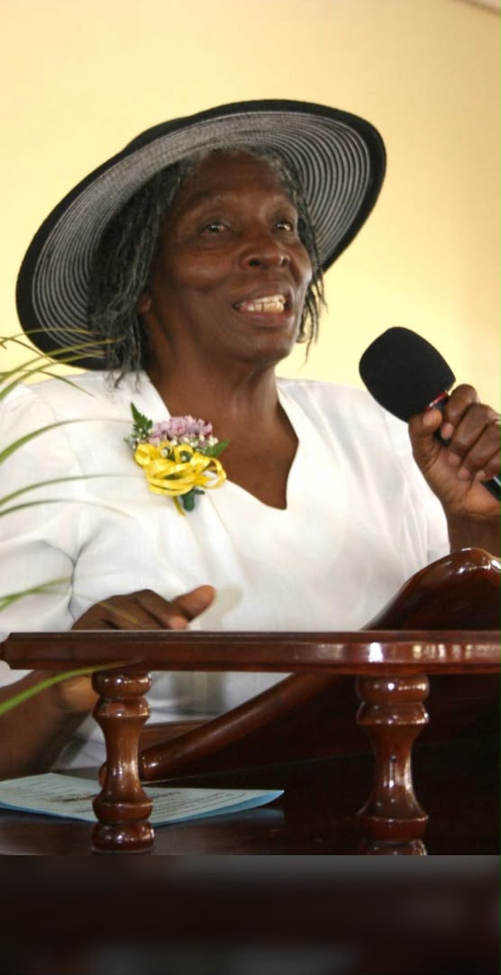 Overseer Teslyn King speaking at Faith Mission Church of God